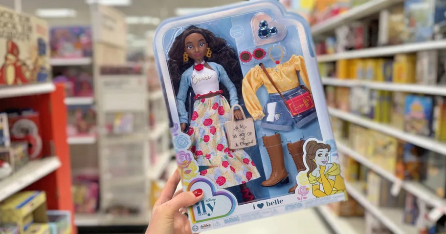 hand holding up boxed Disney ILY 4EVER Belle Doll in store