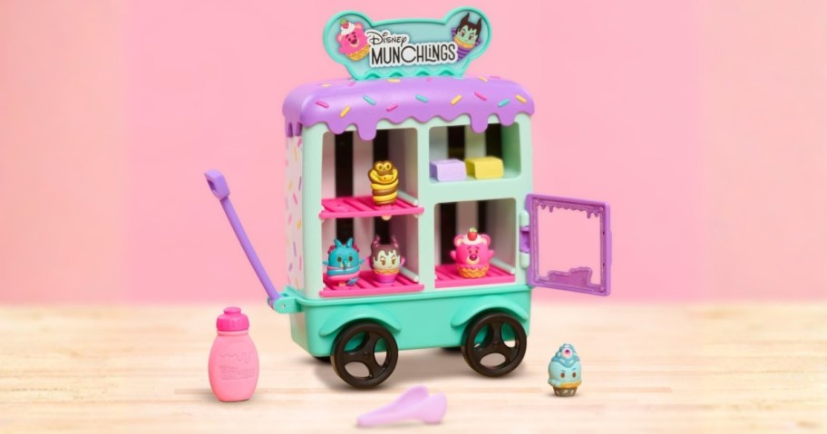 disney munchlings ice cream cart play set with figures and pieces on wood table