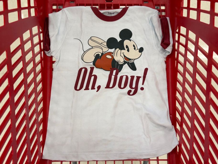 A graphic tee in a Target shopping cart with a Mickey Mouse and the phrase Oh Boy! on it