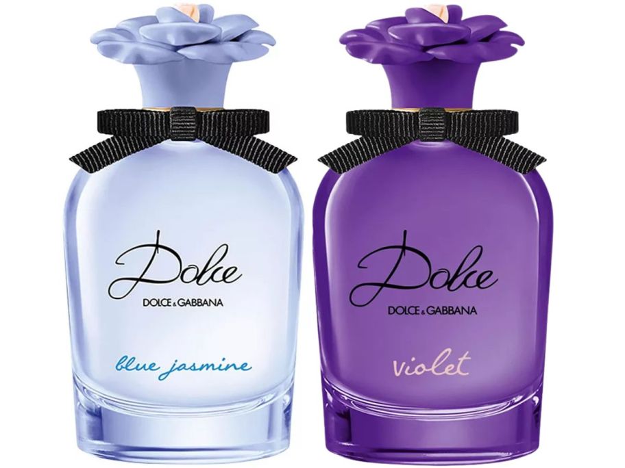 a blue and a purple bottle of perfume