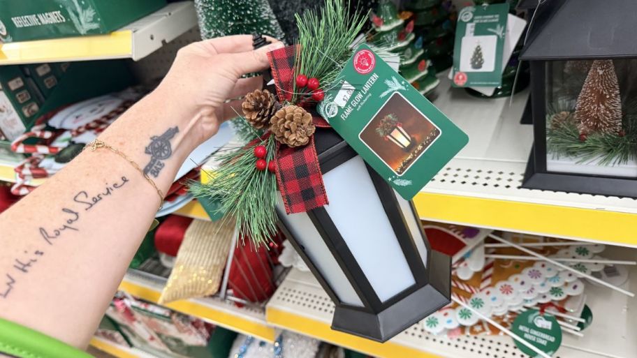 hand holding Dollar Tree Christmas glow lantern
