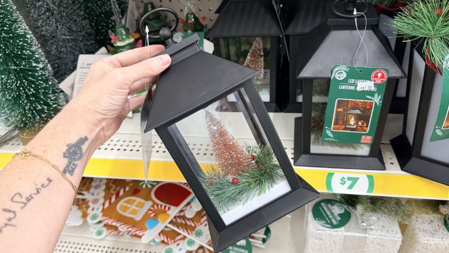 hand holding Dollar Tree Christmas lantern