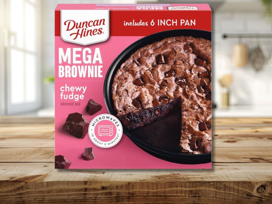 A pink brownie box on a countertop