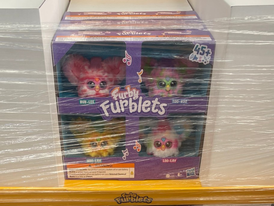 four pack of Furby furblets on display in-store
