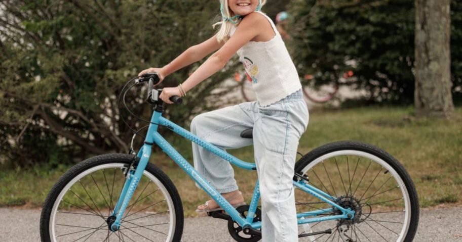 Girl Riding a Guardian Bike