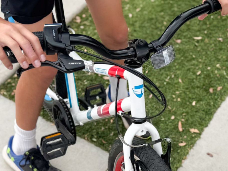 Front of a Guardian Bike with a boy on it