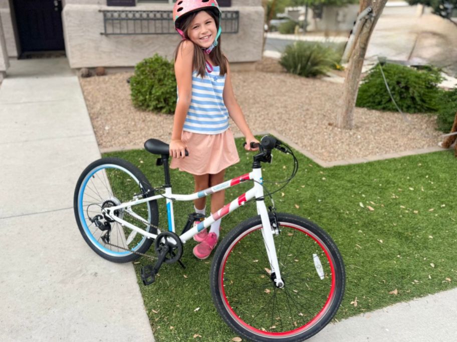 Girl standing behind a Guardian Bike