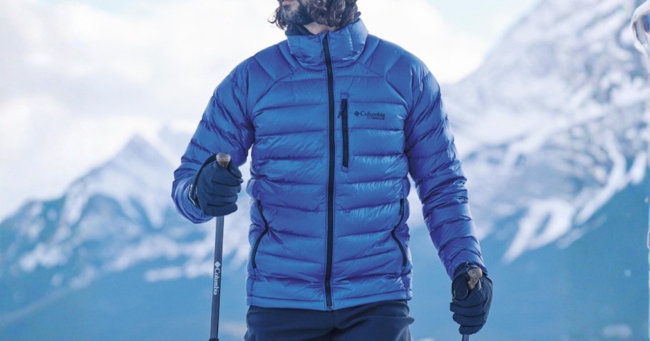 man skiing wearing a blue Columbia jacket