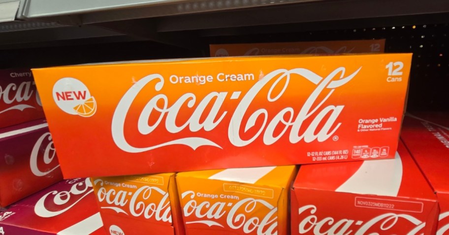 cases of Coca Cola Orange Cream canned drinks