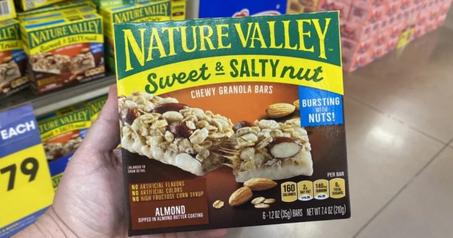 hand holding a box of Nature Valley bars
