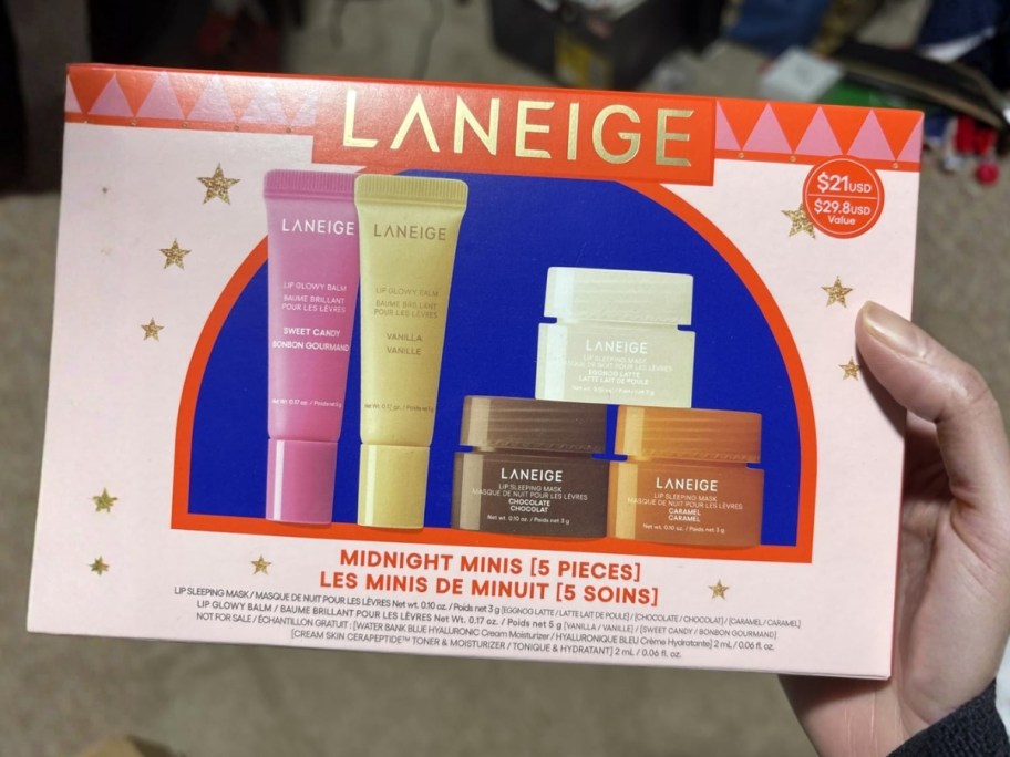 hand holding a box with a Laniege lip set