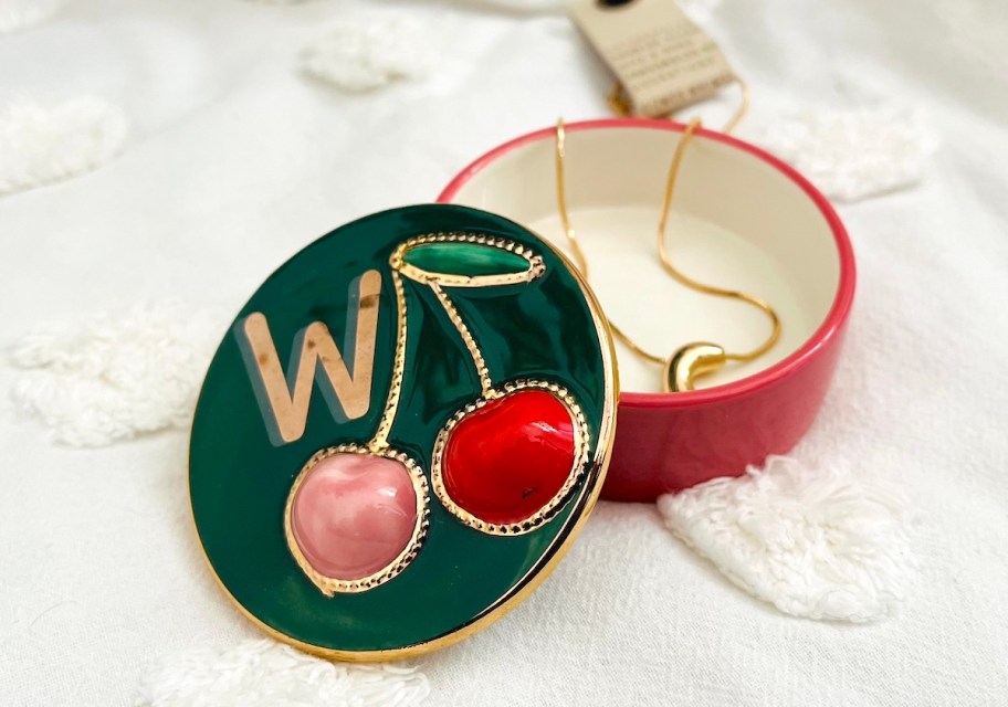 monogram cherry trinket dish with gold necklace