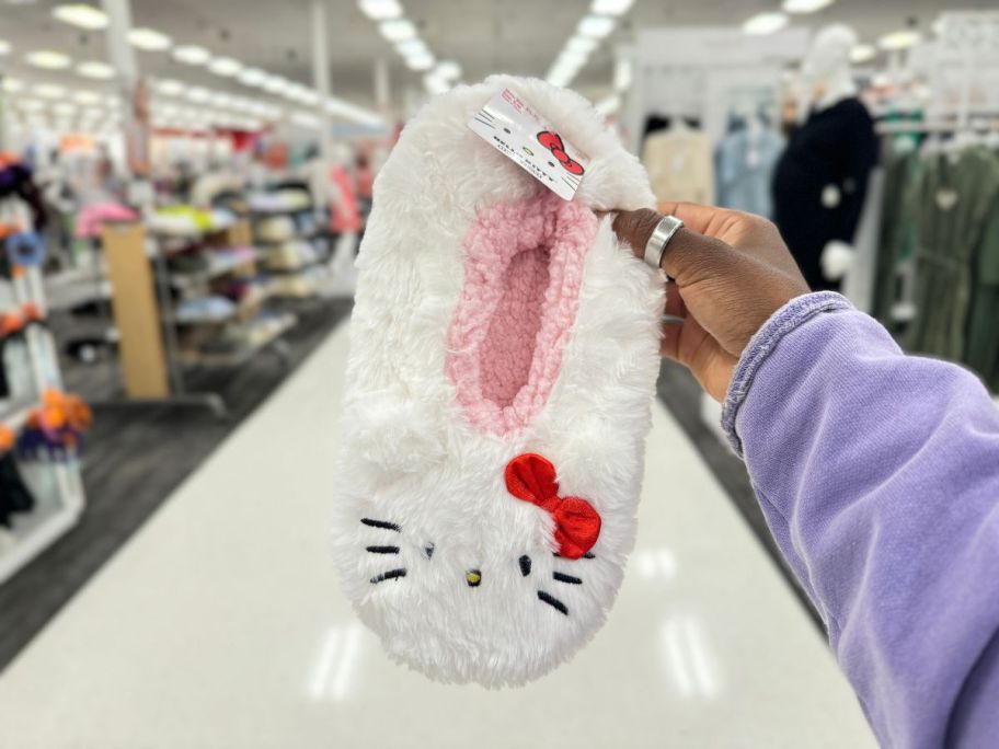 Hand holding Hello Kitty Slipper Socks