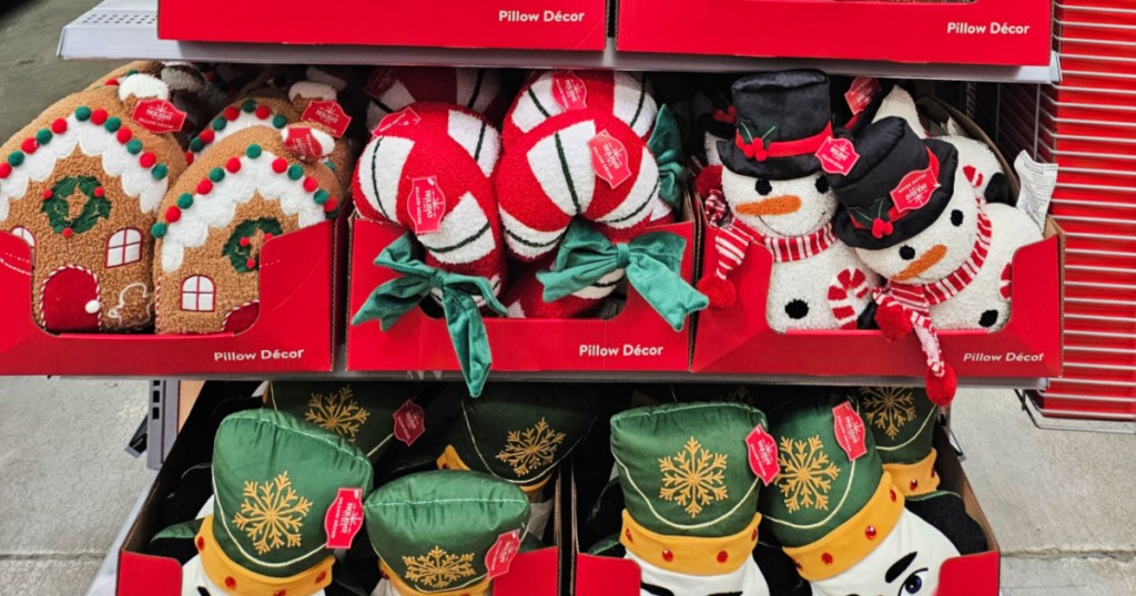 Christmas pillows on display in Walmart store
