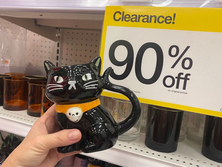 hand holding Hyde and EEK! Figural Black Cat Mug
