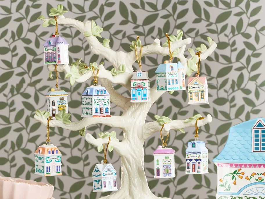 Lenox Spice Village Ornaments hanging from a tree
