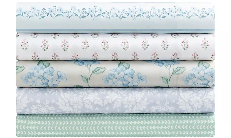 stack of printed bed sheets