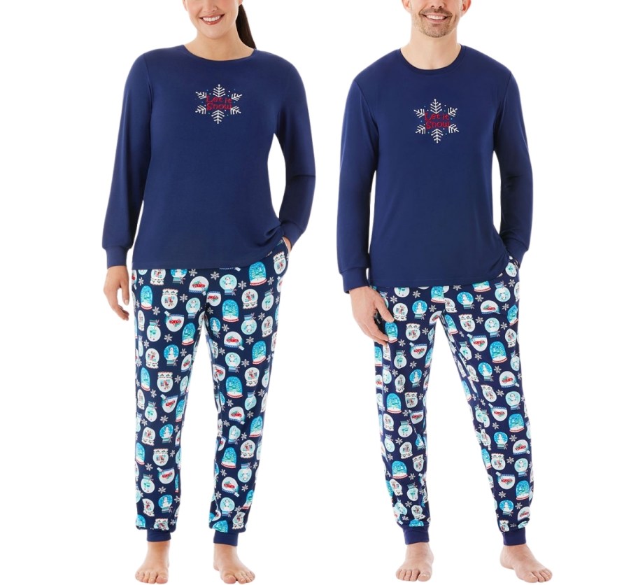 a woman and a man wearing matching christmas pjs