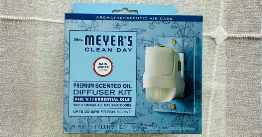 Mrs. Meyer's Clean Day Premium Scented Oil Diffuser Kit in Rain Water on counter