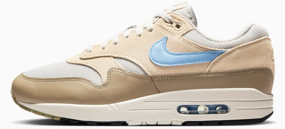 tan and blue nike sneaker
