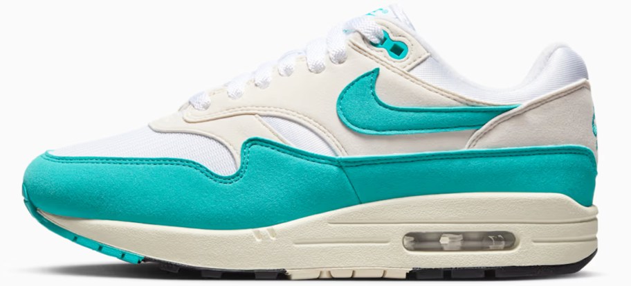 white and teal nike sneaker