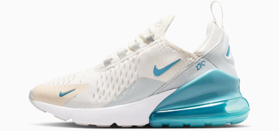 white and blue nike sneaker