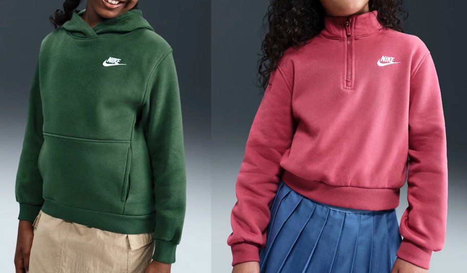 two kids in green and red nike sweatshirts