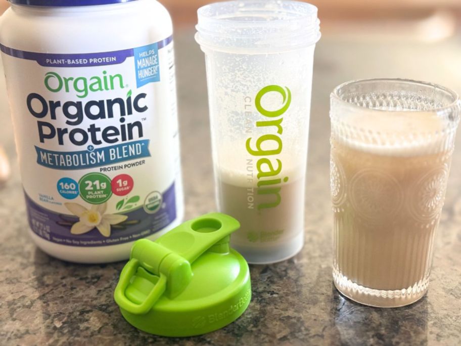 Orgain Organic Protein Powder + Metabolism Blend 27.4oz - Vanilla Bean with a shaker bottle