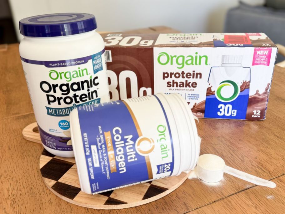 two tubs of Orgain protein powder and premade shakes