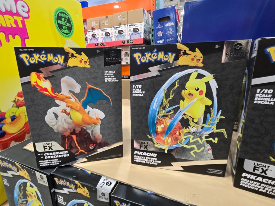 Two Pokemon figurine boxes.