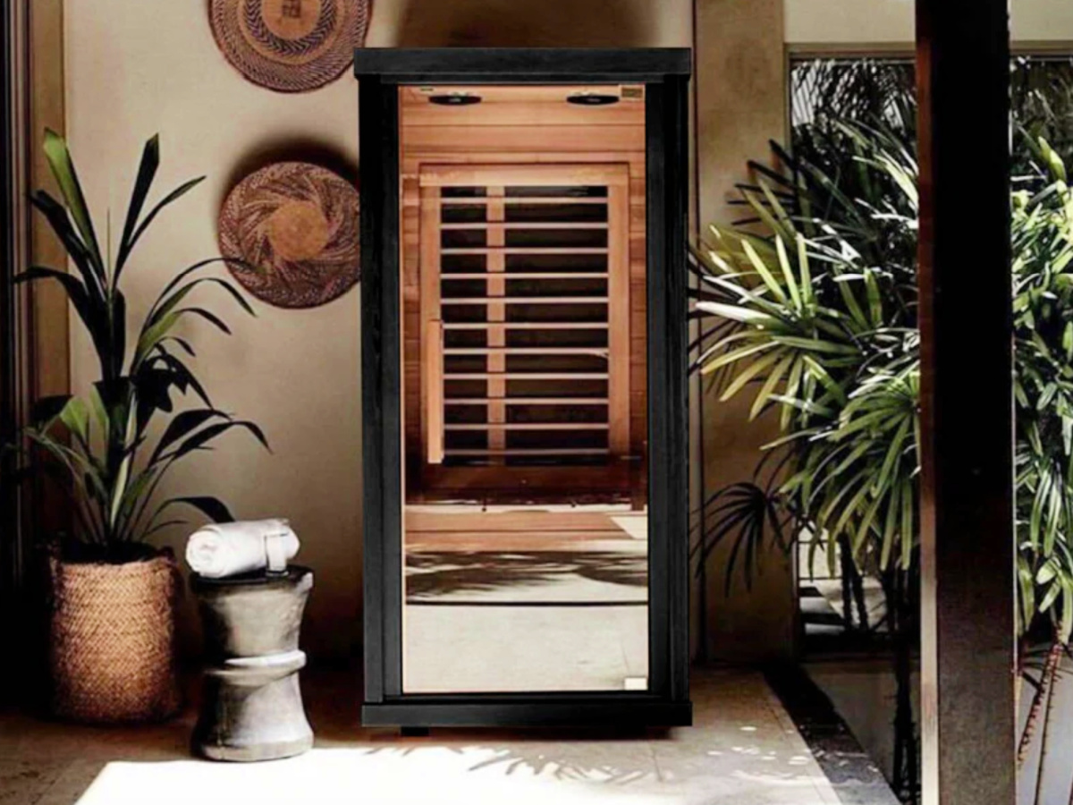 Sun home one person sauna inside home next to plants