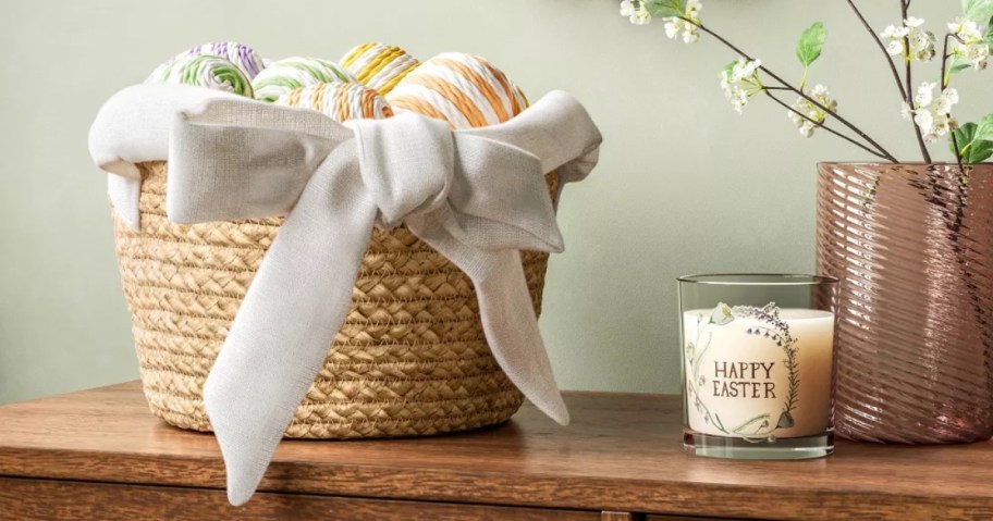 threshold spring woven basket with bow handle on console