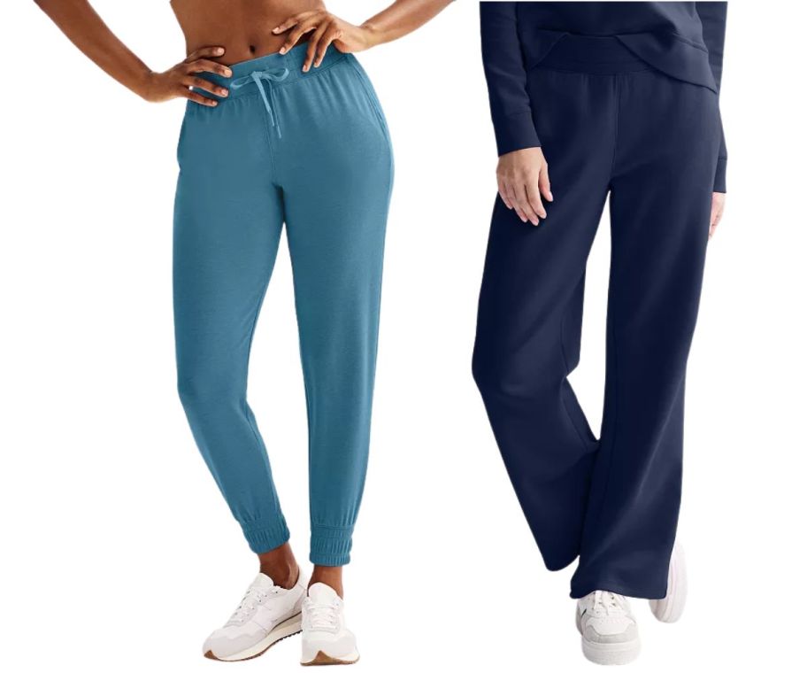 2 women wearing blue sweatpants
