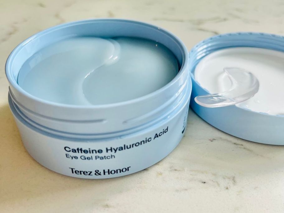 A blue canister of eye patches