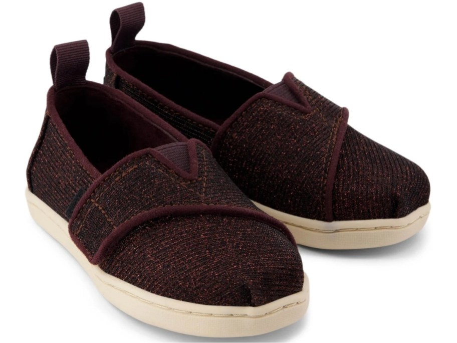 a pair of burgundy toddler slip on shoes
