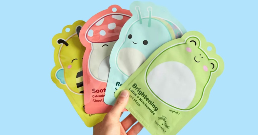 person holding Tony Moly Masks in hand