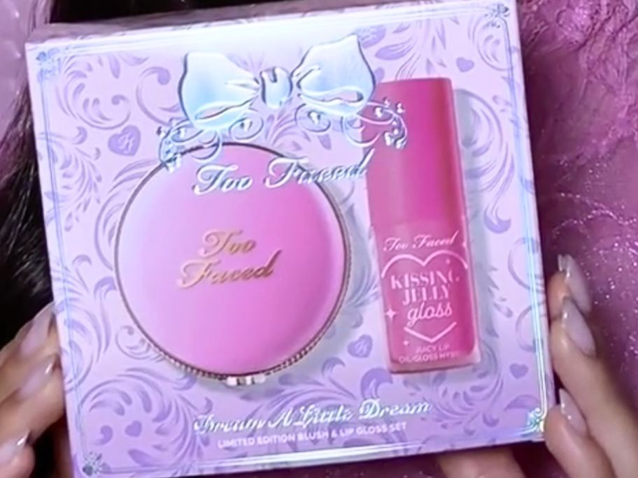 Hands holding Too Faced Dream A Little Dream Set