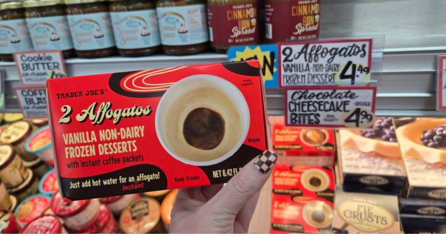 a person holding a frozen treat box