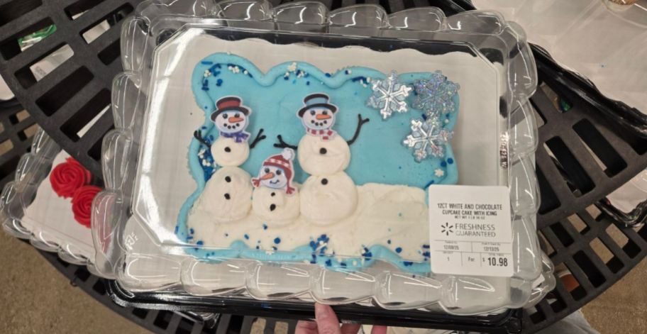 a blue and white Snowmen Cupcake Cake
