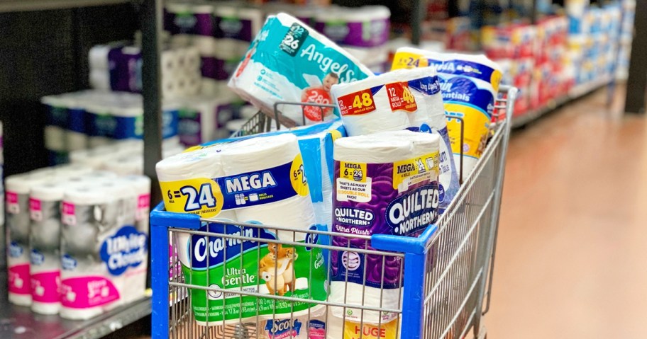 various packs of toilet paper in a walmart shopping cart
