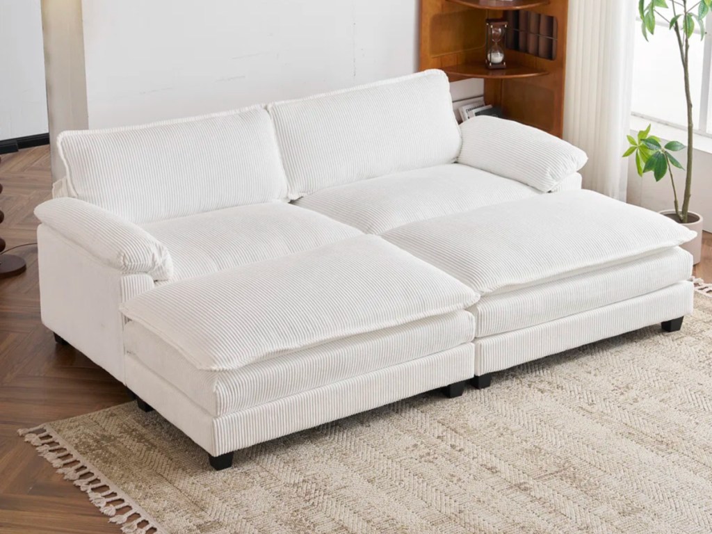 White corduroy couch in living room