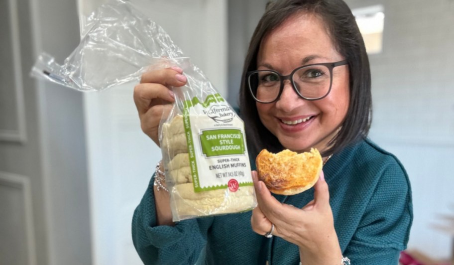 woman holding up a Wolferman's English Muffins and package