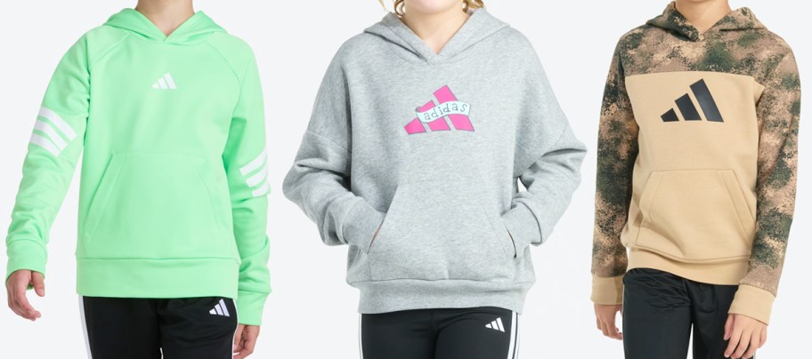 three kids in adidas hoodies