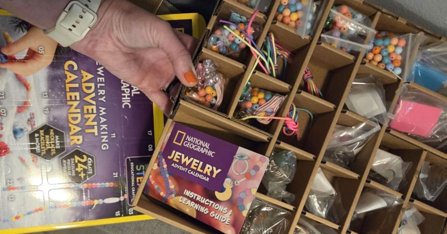 hand touching national geographic jewelry making advent calendar