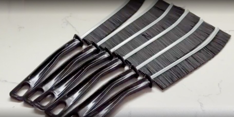 six black crevice cleaners 