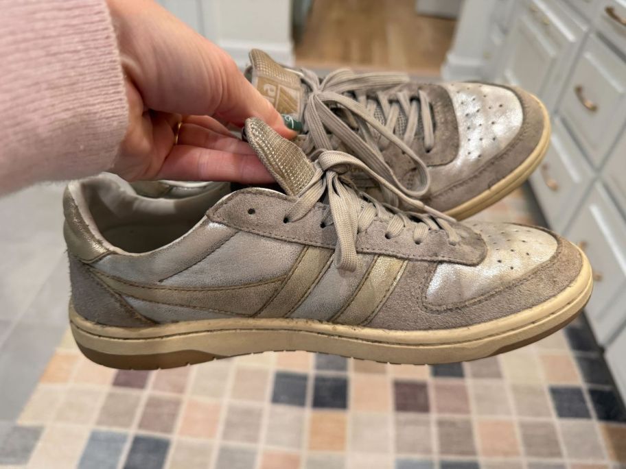 collin holding Gola Hawk Metallic Sneakers