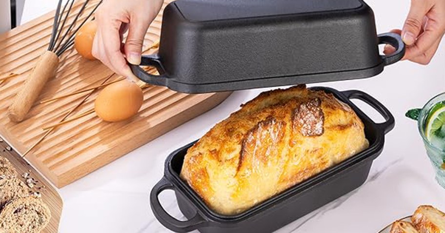 person using cast iron loaf pan to bake bread