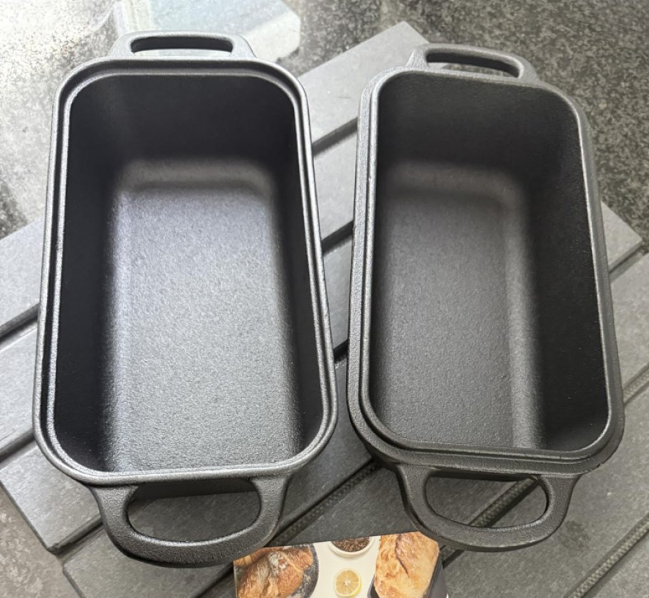 cast iron loaf pans on a table