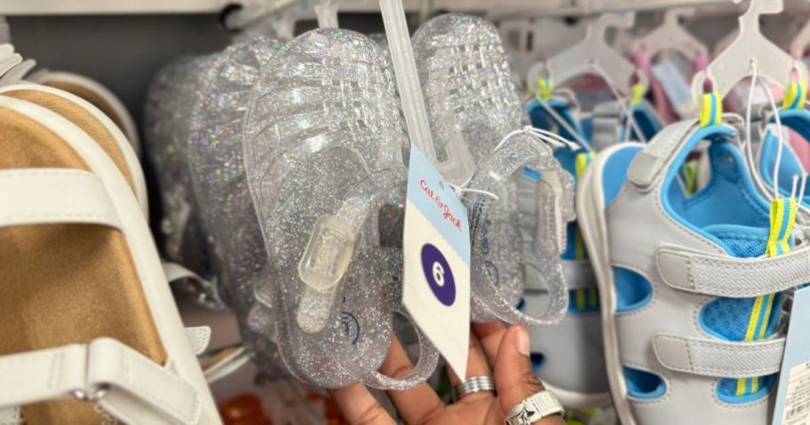 jelly sandals hanging in store