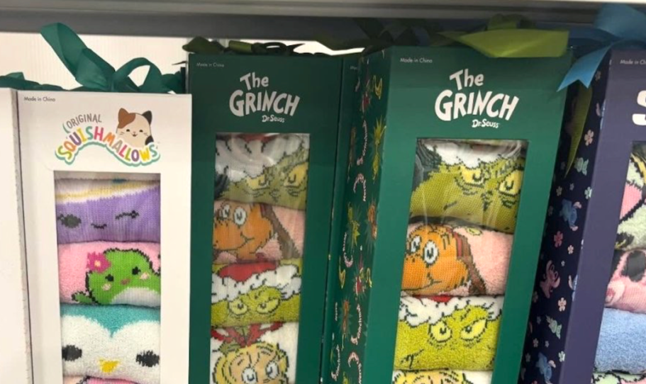 grinch sock advent calendars on shelf